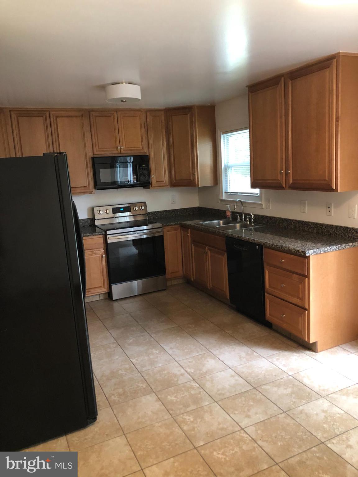 320 Laburnum Road Edgewood, MD 21040 - Photo 7 of 33 Updated kitchen with 42" wood cabinets