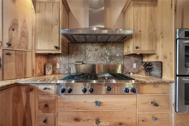 a living room with furniture a rug and a flat screen tv