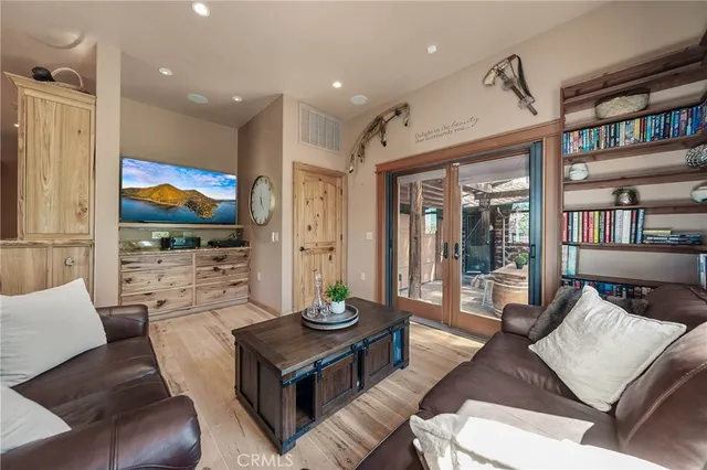 a bathroom with a shower and a glass door