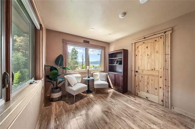 a bathroom with a toilet a sink and a washing machine