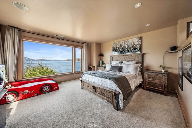 a view of a terrace with a table and chairs