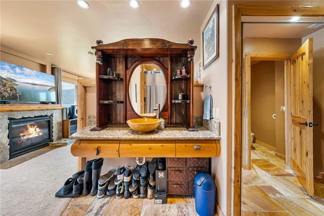 a view of a garage with wooden table and chairs