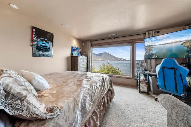 a living room with lots of furniture and a rug