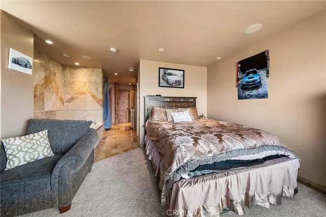 a kitchen with granite countertop cabinets stainless steel appliances and a sink
