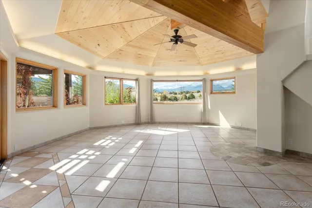 a view of an entryway with a chandelier