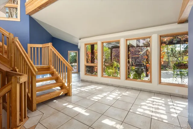 a view of a living room with a large window
