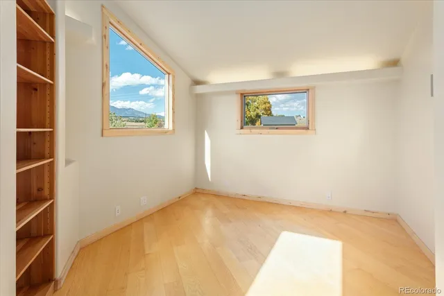 a workspace with furniture and window