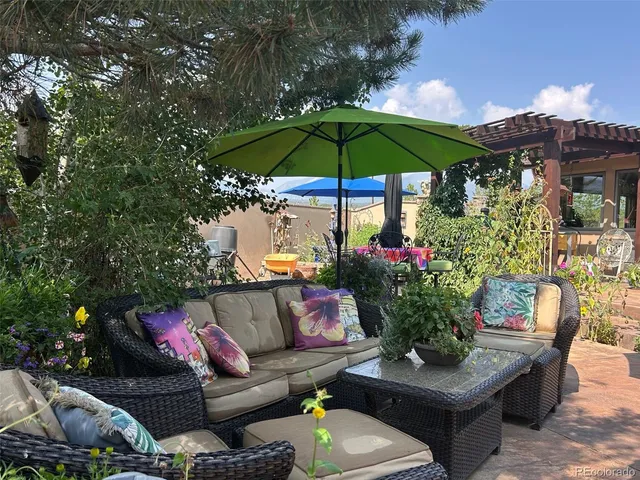 a view of a two couches in the patio