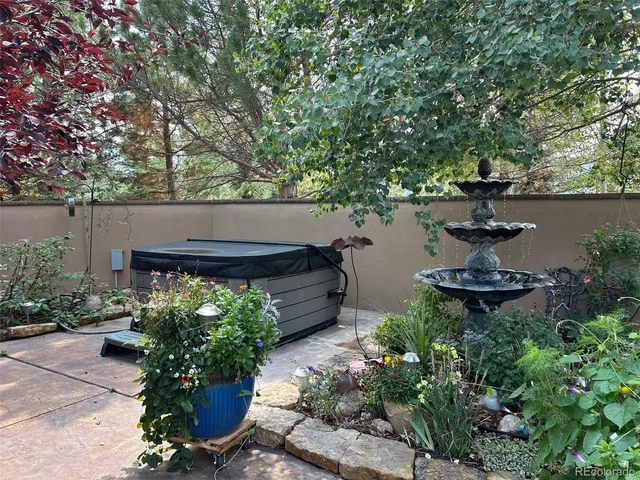 a garden view with a seating space