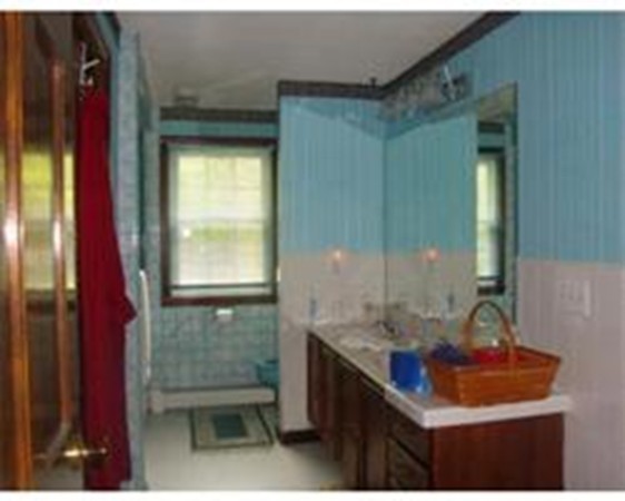 419 Wares Road Ashby, MA 01431 - Photo 11 of 21 a bathroom with a sink and a mirror