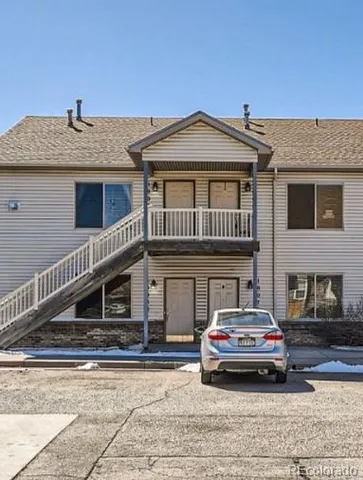a car parked in front of a house