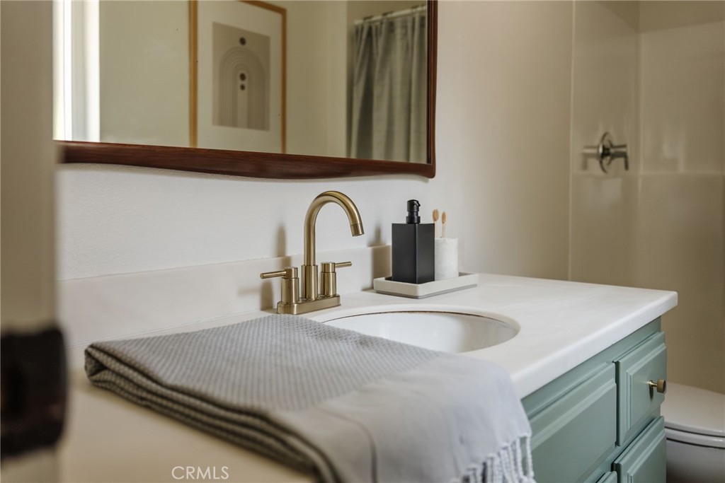 246 Alpine Street, Unit 5 Pasadena, CA 91106 - Photo 14 of 26 a kitchen with a sink a stove and microwave