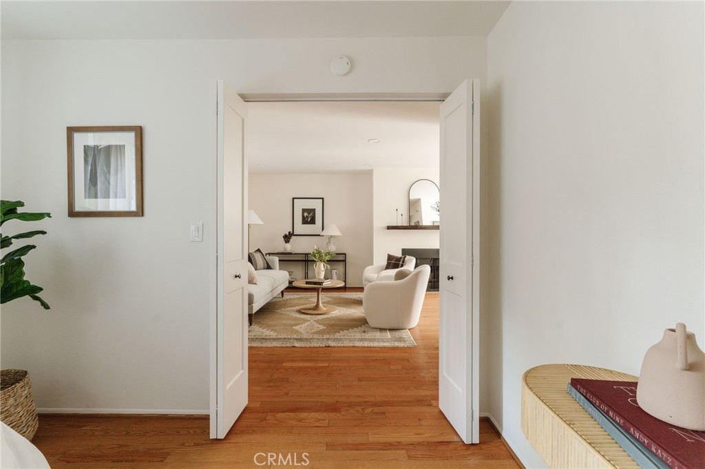 246 Alpine Street, Unit 5 Pasadena, CA 91106 - Photo 19 of 26 a living room with furniture and a table