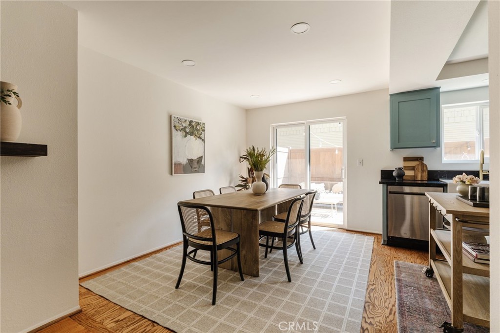 246 Alpine Street, Unit 5 Pasadena, CA 91106 - Photo 4 of 26 a view of a dining room with furniture and window
