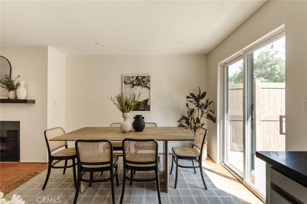 246 Alpine Street, Unit 5 Pasadena, CA 91106 - Photo 6 of 26 a view of a dining room with furniture and window