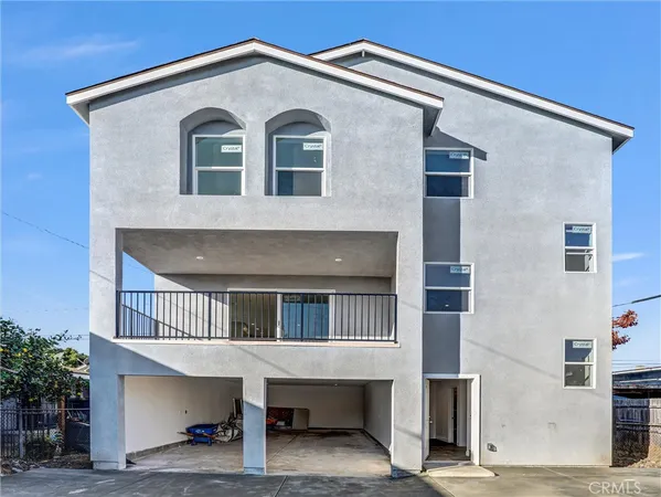 a front view of a house with a balcony