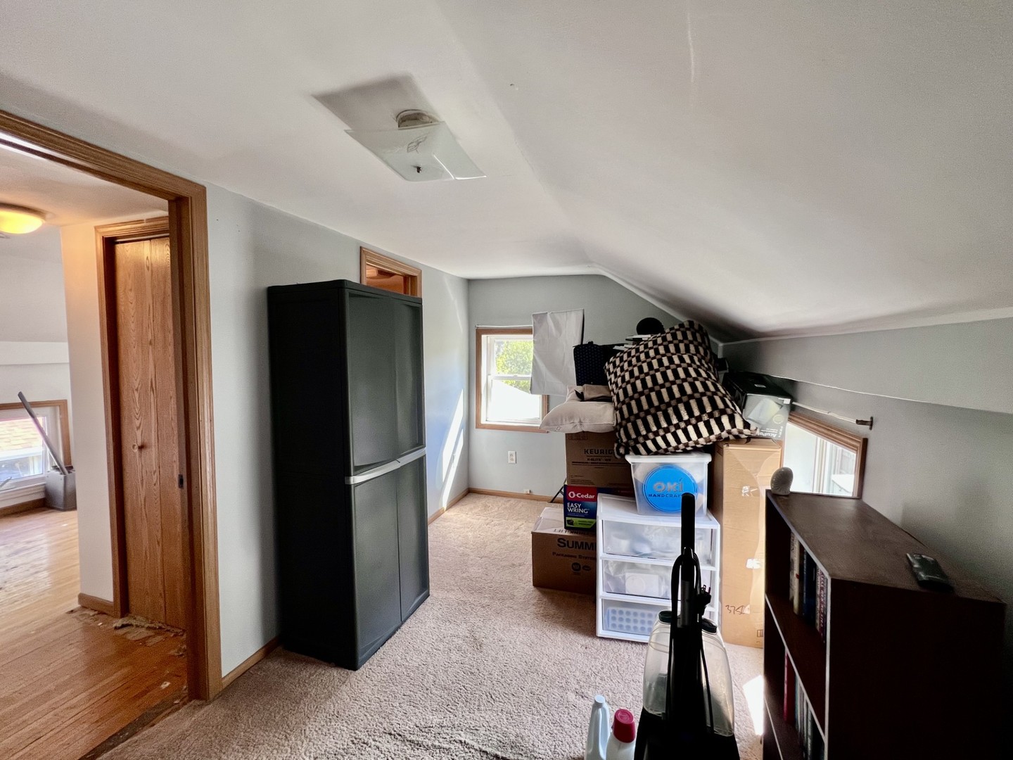 1410 3rd Avenue Sterling, IL 61081 - Photo 11 of 13 a view of a hallway with stairs and furniture