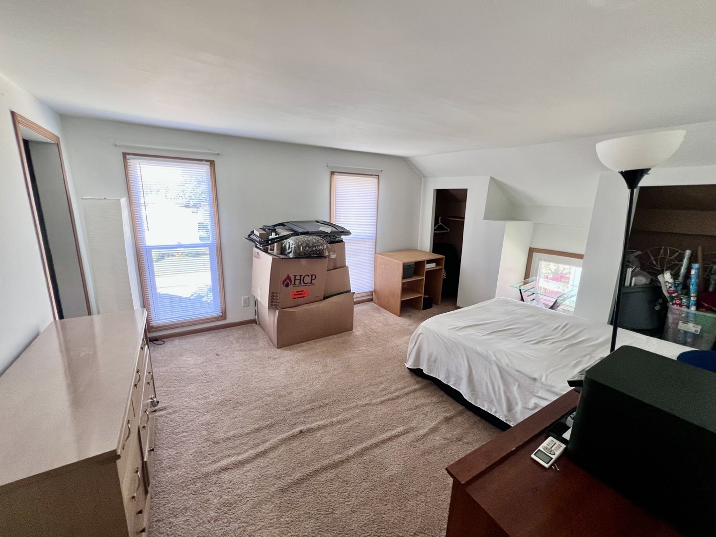 1410 3rd Avenue Sterling, IL 61081 - Photo 9 of 13 a bedroom with a bed and wooden floor