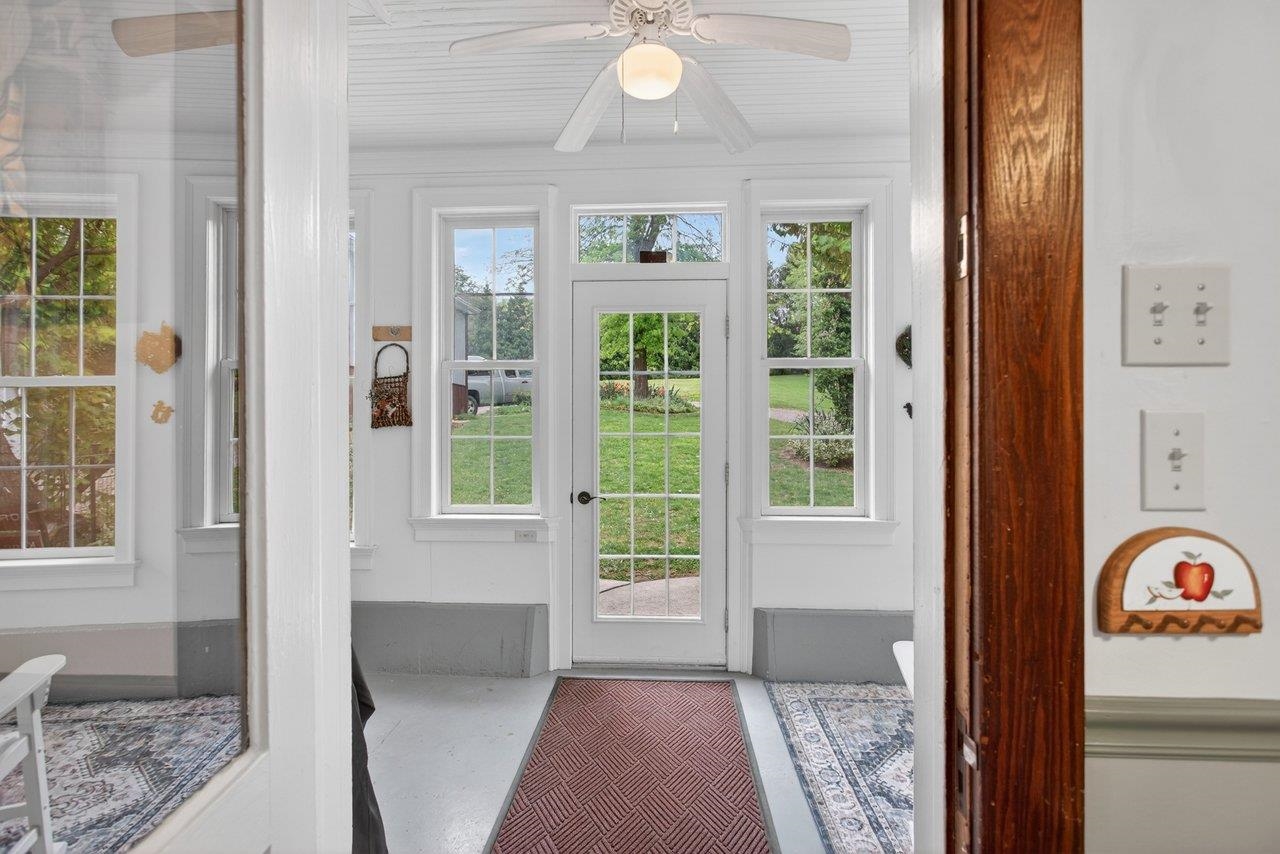 107 Timber Way Broadway, VA 22815 - Photo 11 of 73 a view of an entryway with wooden floor and a livingroom