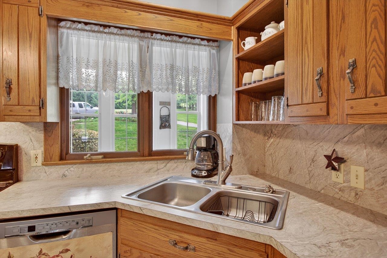 107 Timber Way Broadway, VA 22815 - Photo 18 of 73 a kitchen with a sink and a window