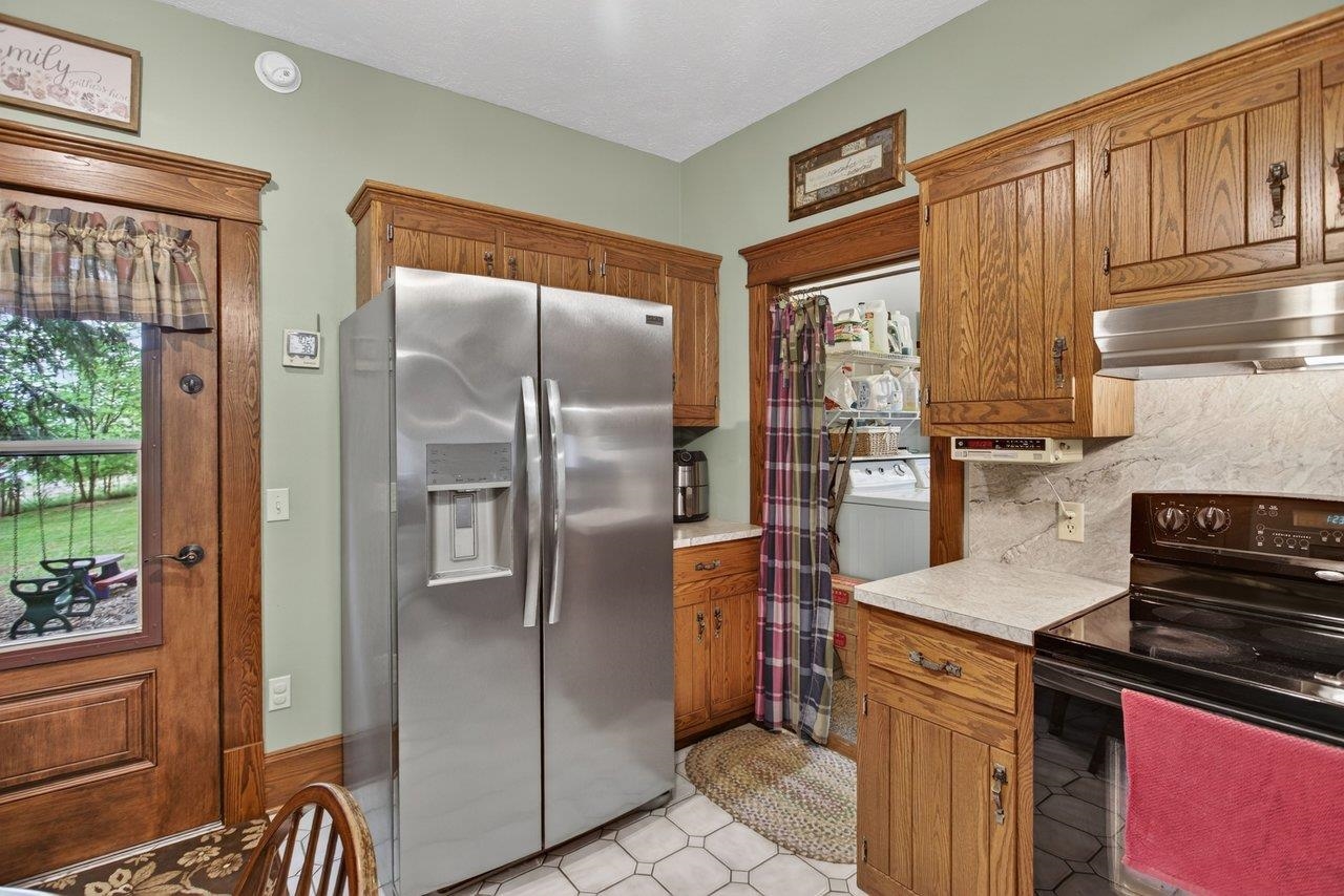 107 Timber Way Broadway, VA 22815 - Photo 21 of 73 a kitchen with stainless steel appliances granite countertop a refrigerator and a stove top oven