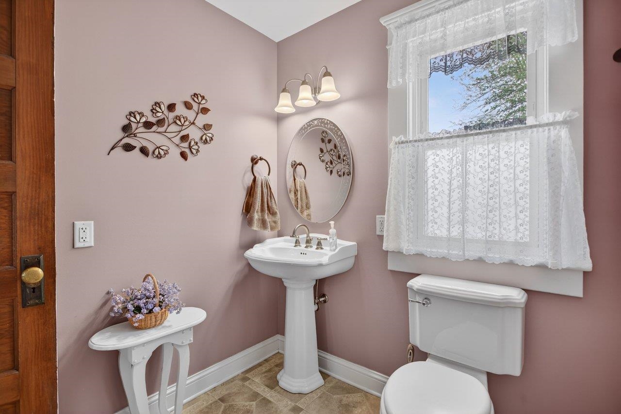 107 Timber Way Broadway, VA 22815 - Photo 36 of 73 a bathroom with a sink mirror and toilet