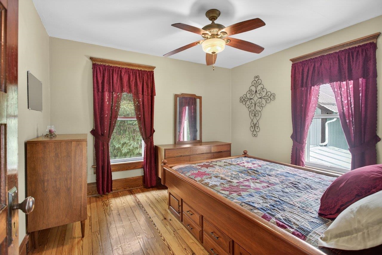 107 Timber Way Broadway, VA 22815 - Photo 38 of 73 a bedroom with a bed and a dresser