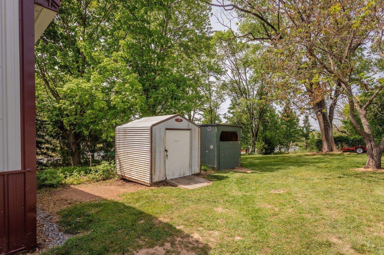 107 Timber Way Broadway, VA 22815 - Photo 56 of 73 a view of a backyard with large tree and wooden fence