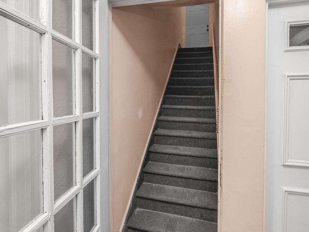 3357 Perry Avenue Bronx, NY 10467 - Photo 12 of 31 Stairs featuring baseboards