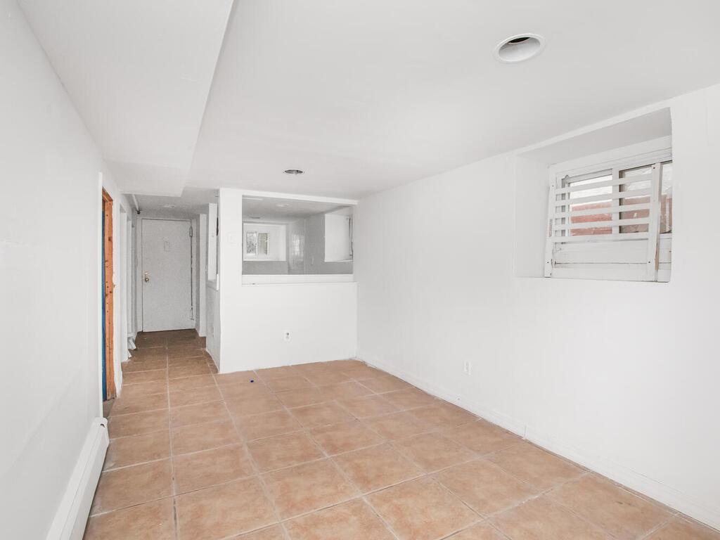 3357 Perry Avenue Bronx, NY 10467 - Photo 26 of 31 Unfurnished room featuring light tile patterned floors
