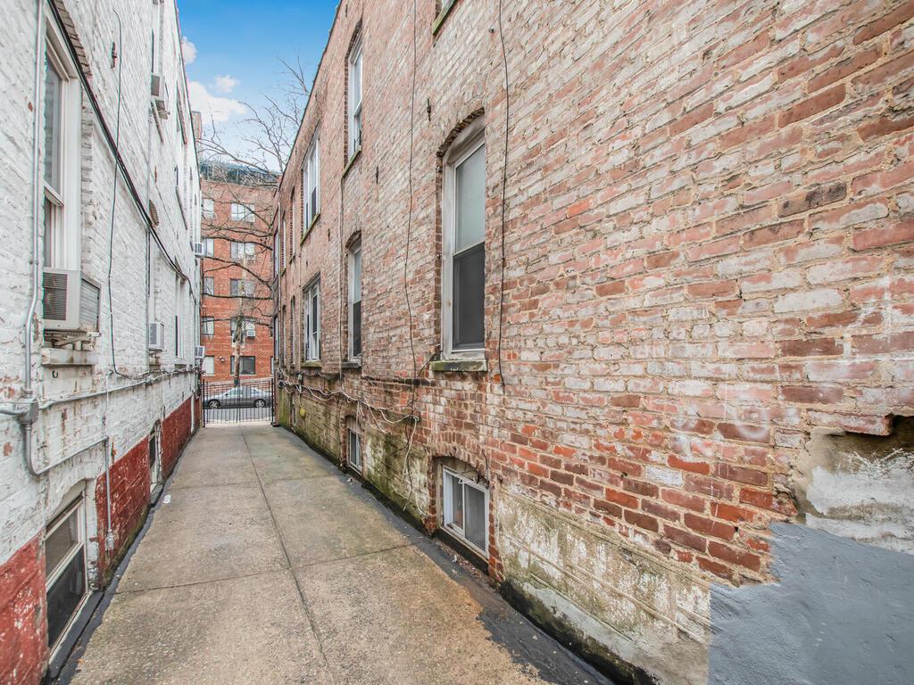 3357 Perry Avenue Bronx, NY 10467 - Photo 29 of 31 View of home's exterior with brick siding