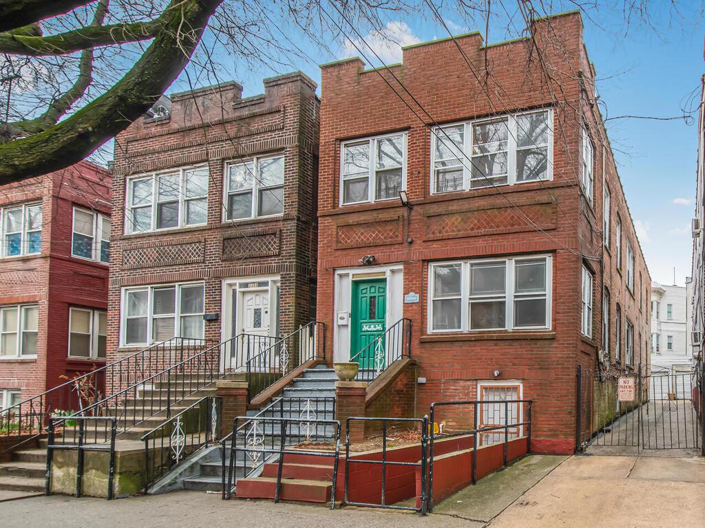 3357 Perry Avenue Bronx, NY 10467 - Photo 30 of 31 Townhome / multi-family property with brick siding and a gate