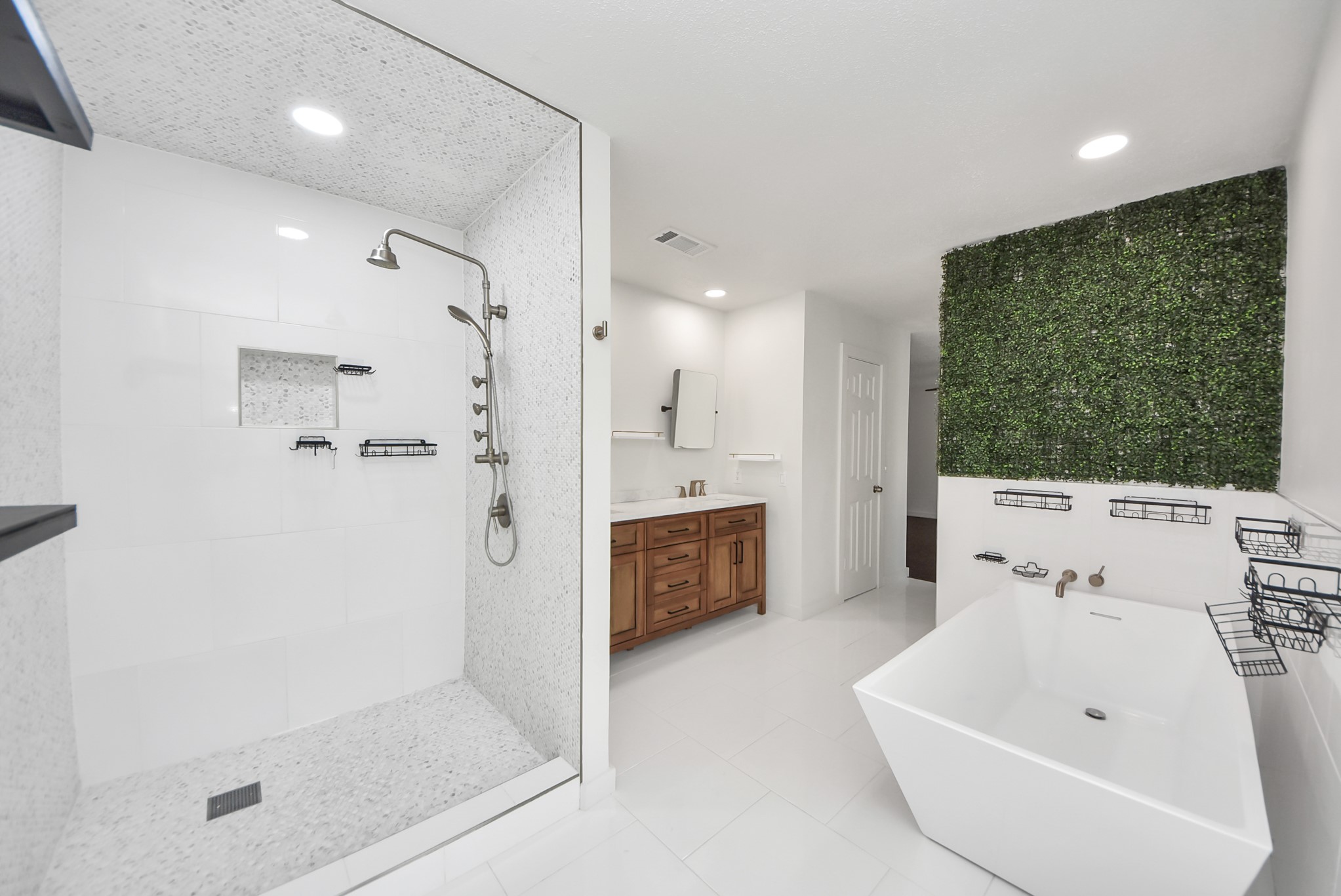 12614 Mill Ridge Drive Cypress, TX 77429 - Photo 31 of 44 a bathroom with a bathtub and a sink