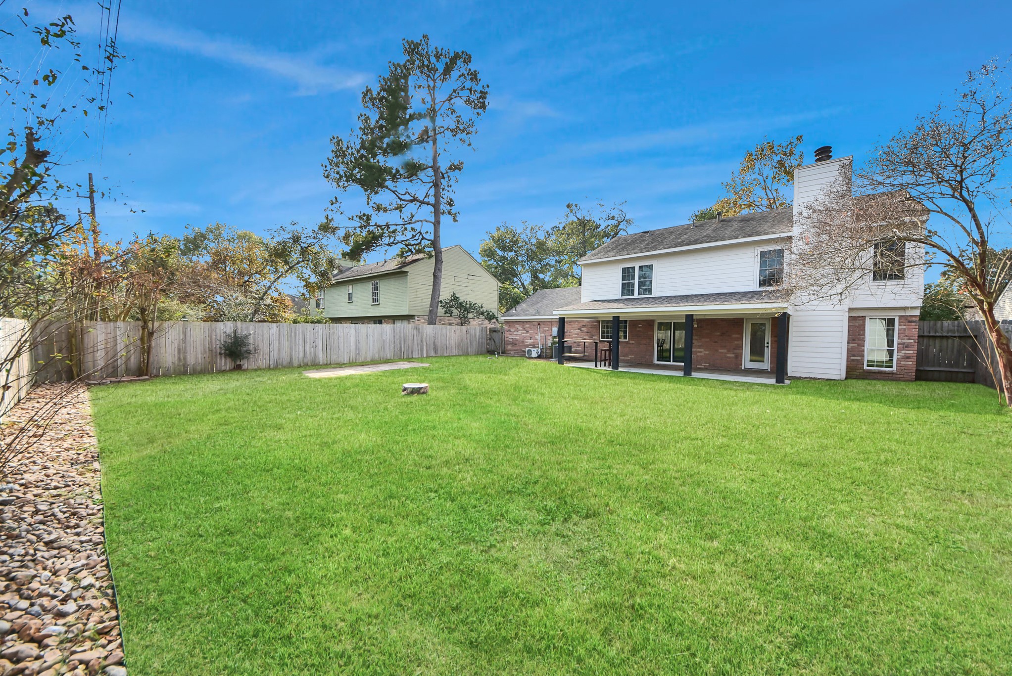 12614 Mill Ridge Drive Cypress, TX 77429 - Photo 39 of 44 a view of a house with a yard