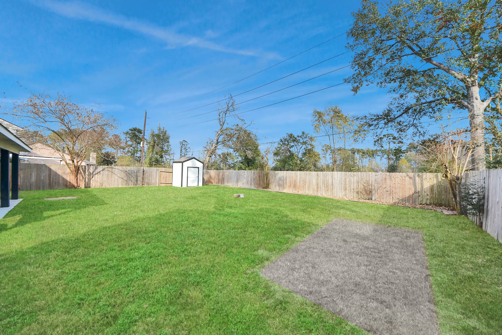 12614 Mill Ridge Drive Cypress, TX 77429 - Photo 42 of 44 a view of a yard with a tree