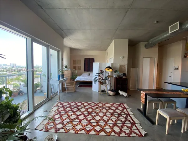 a bedroom with a bed and a walk in closet