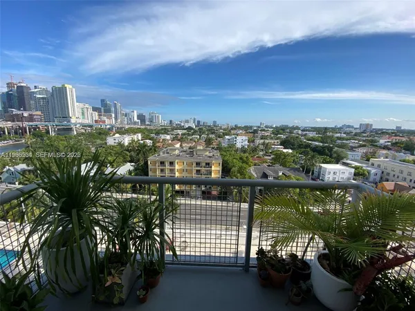 a view of a city with tall buildings