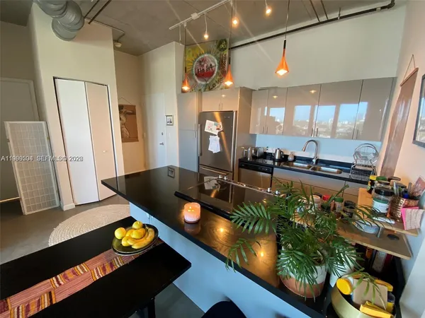 a room with furniture and wooden floor