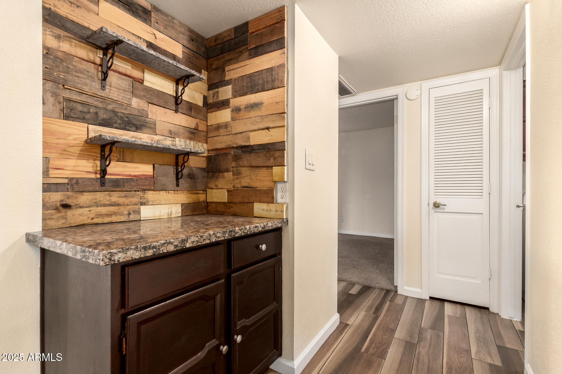 2719 South Santa Barbara Mesa, AZ 85202 - Photo 23 of 37 a kitchen with a sink and cabinets