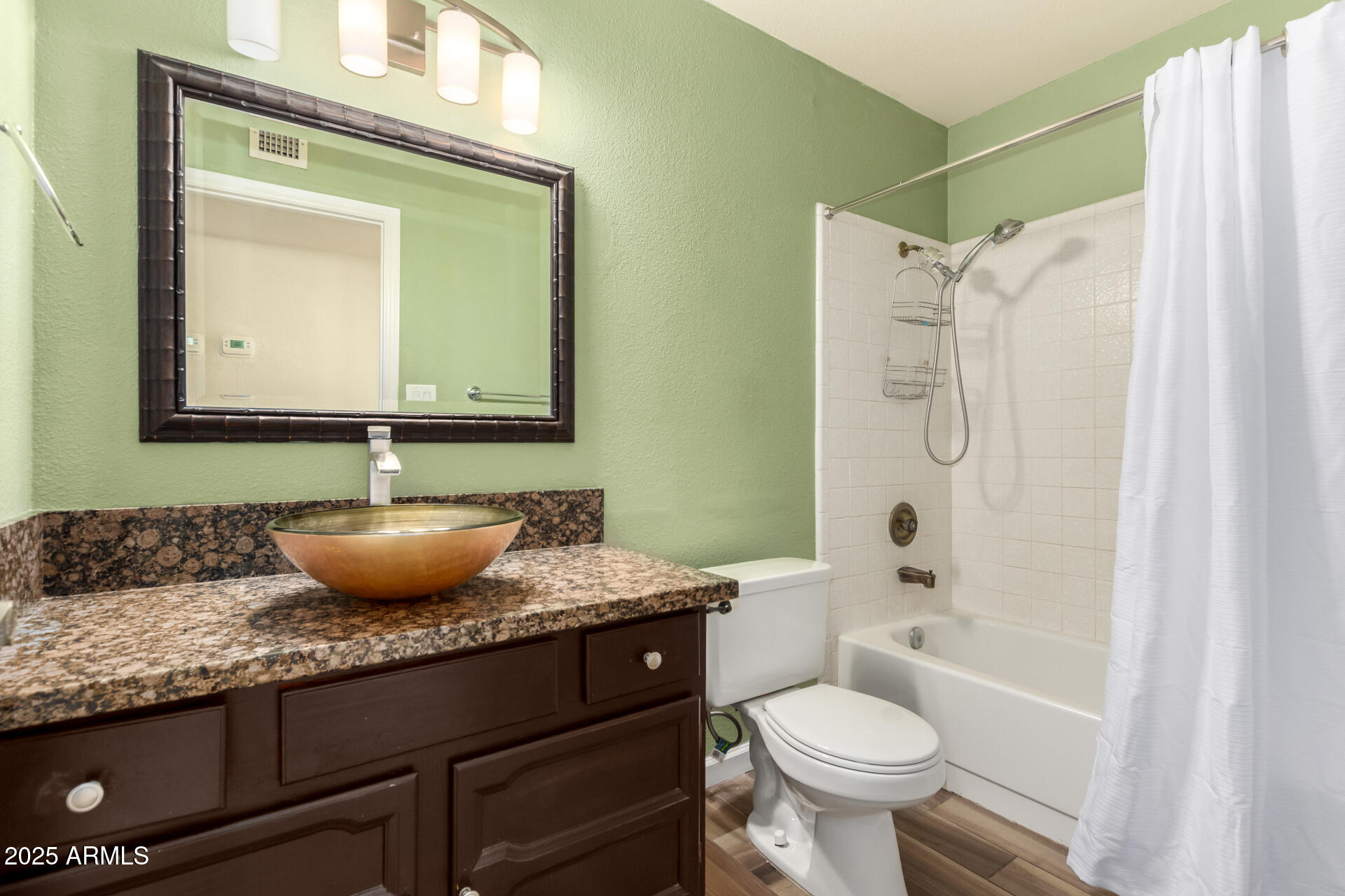 2719 South Santa Barbara Mesa, AZ 85202 - Photo 27 of 37 a bathroom with a granite countertop toilet sink and mirror