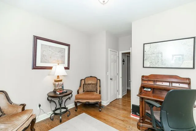 a room with furniture and a window