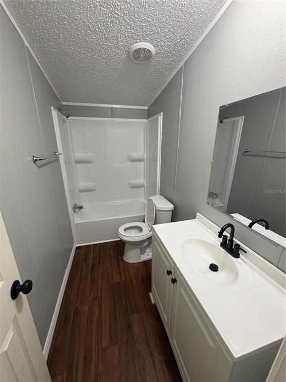 4680 Turner Road Mulberry, FL 33860 - Photo 13 of 26 a bathroom with a sink a toilet and a mirror