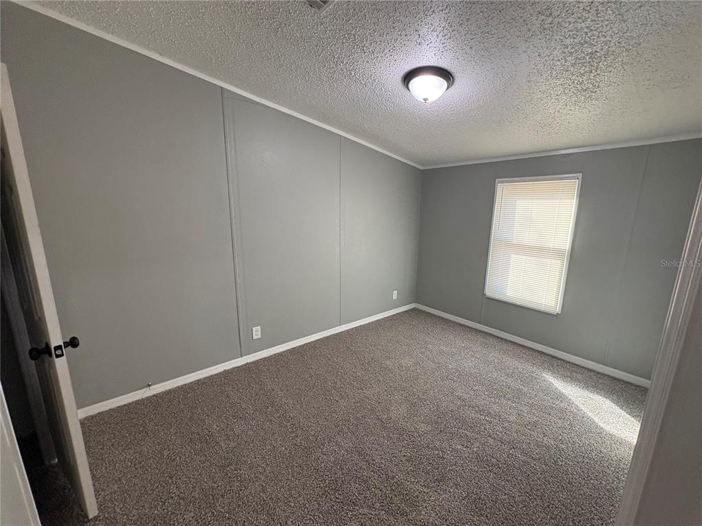 4680 Turner Road Mulberry, FL 33860 - Photo 14 of 26 an empty room with a window