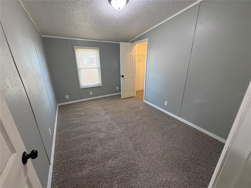 4680 Turner Road Mulberry, FL 33860 - Photo 15 of 26 a view of an empty room with a window