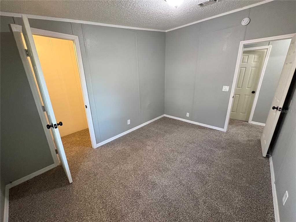 4680 Turner Road Mulberry, FL 33860 - Photo 16 of 26 a view of an empty room with a window
