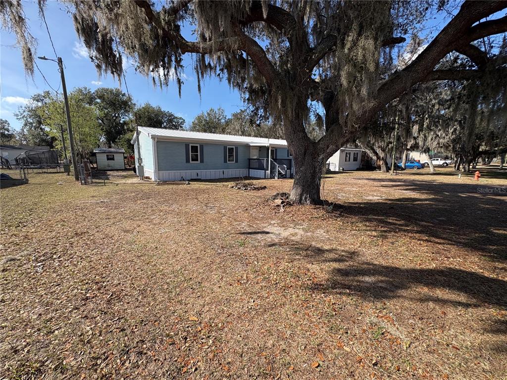 4680 Turner Road Mulberry, FL 33860 - Photo 17 of 26 a view of a house with a yard
