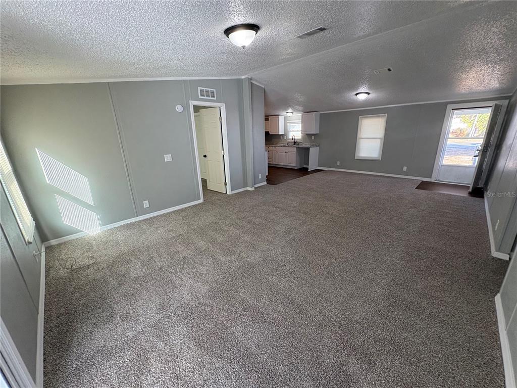 4680 Turner Road Mulberry, FL 33860 - Photo 3 of 26 a view of empty room with a fireplace