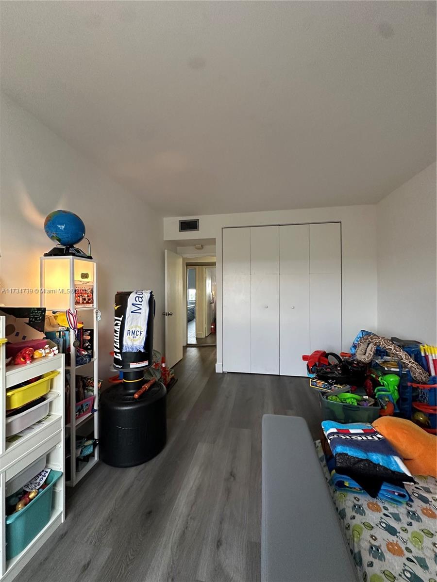 7441 Wayne Avenue, Unit 6B Miami Beach, FL 33141 - Photo 19 of 33 a view of a workspace with furniture and toys