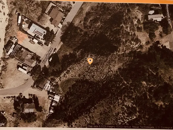 a view of ocean and mountain