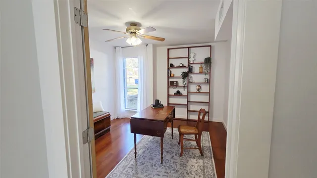 a view of a livingroom with furniture and window